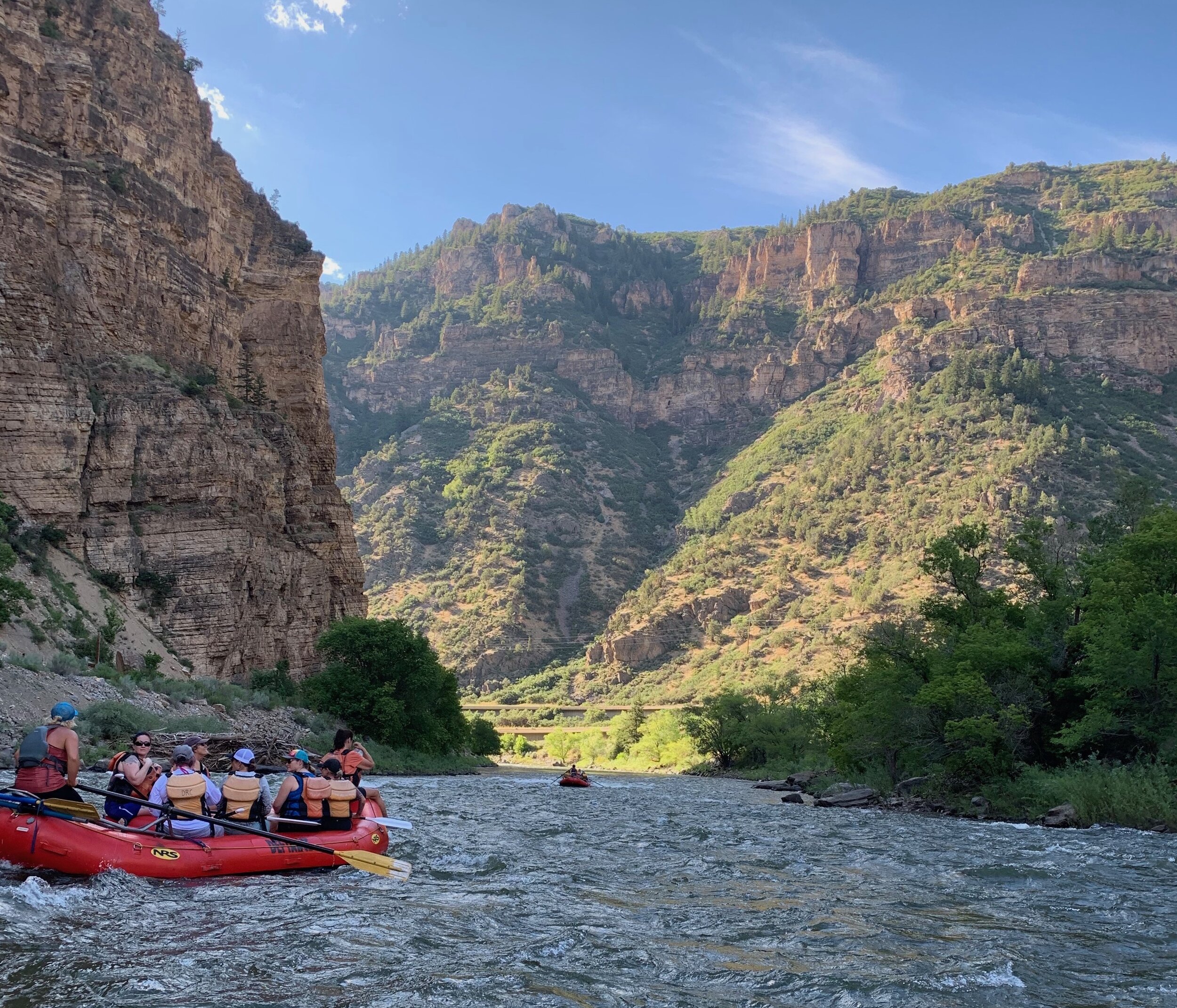 A group of ladies on a river